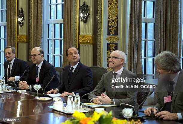 France's ambassador to the Netherlands Pierre Menat, French Economy, Finance and Foreign Trade Minister Pierre Moscovici, France's President Francois...