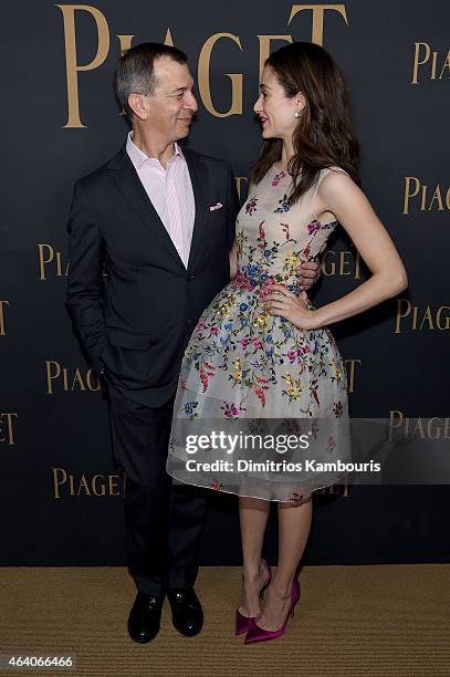 Of Piaget S.A. Philippe Leopold Metzger and actress Emmy Rossum attend the 30th Annual Film Independent Spirit Awards at Santa Monica Beach on...