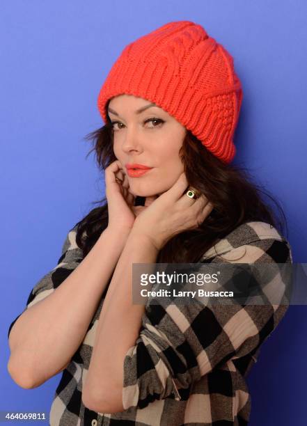 Director and actress Rose McGowan poses for a portrait during the 2014 Sundance Film Festival at the Getty Images Portrait Studio at the Village At...