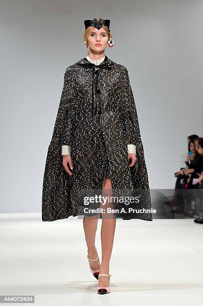 Model walks the runway in designs by Minju Kim at the Ones To Watch show during London Fashion Week Fall/Winter 2015/16 at Fashion Scout Venue on...