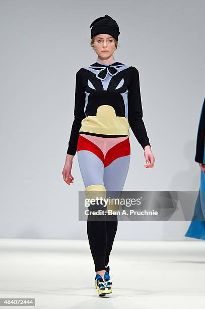 Model walks the runway in designs by Minju Kim at the Ones To Watch show during London Fashion Week Fall/Winter 2015/16 at Fashion Scout Venue on...