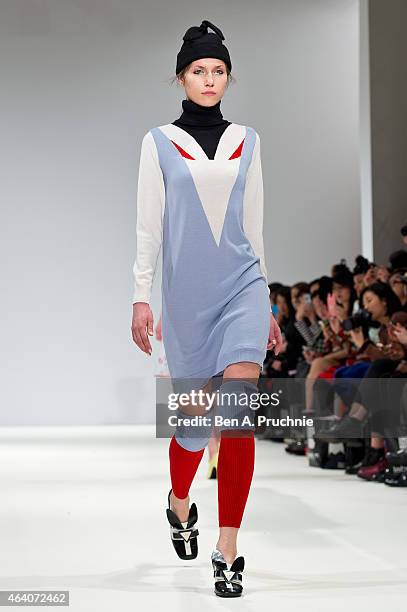 Model walks the runway in designs by Minju Kim at the Ones To Watch show during London Fashion Week Fall/Winter 2015/16 at Fashion Scout Venue on...