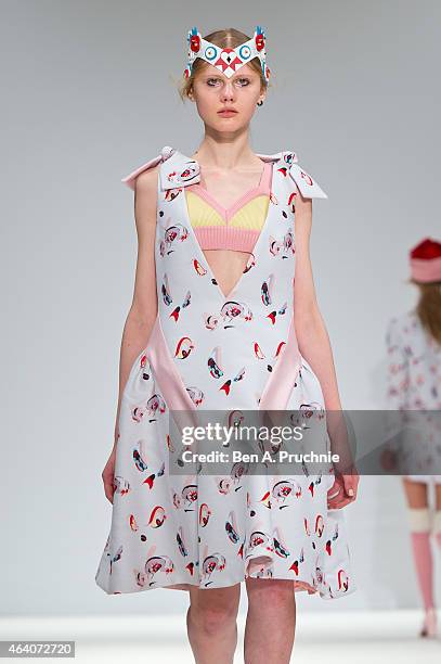 Model walks the runway in designs by Minju Kim at the Ones To Watch show during London Fashion Week Fall/Winter 2015/16 at Fashion Scout Venue on...