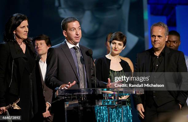 Director Laura Poitras, lawyer Glenn Greenwald, producers Mathilde Bonnefoy and Dirk Wilutzky accept Best Documentary award for 'Citizenfour' onstage...