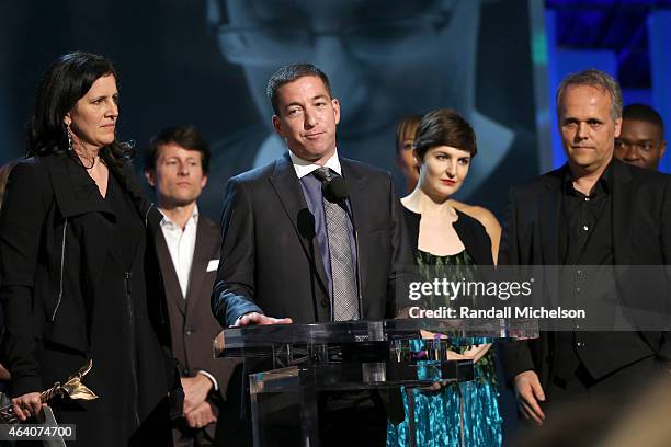 Director Laura Poitras, lawyer Glenn Greenwald, producers Mathilde Bonnefoy and Dirk Wilutzky accept Best Documentary award for 'Citizenfour' onstage...