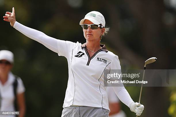 Karrie Webb of Australia signals right after spraying an approach shot on the 2nd hole during day four of the LPGA Australian Open at Royal Melbourne...