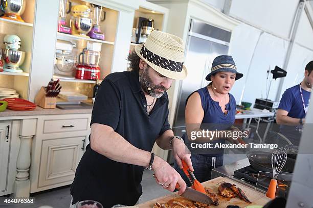 Rachael Ray and her husband John Cusimano give a culinary demonstration at the Whole Foods Market Grand Tasting Village Featuring MasterCard Grand...