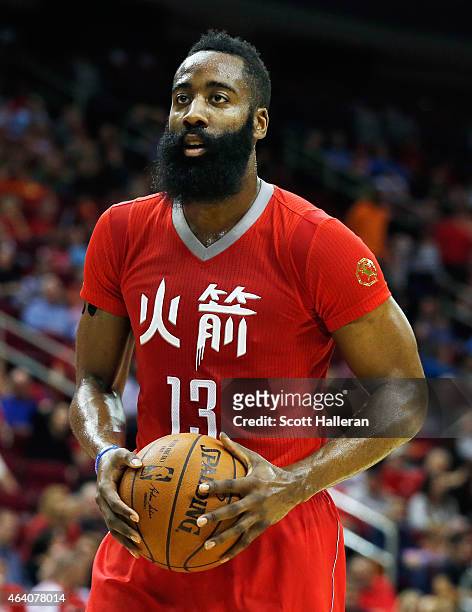 James Harden of the Houston Rockets waits on the court during their game against the Toronto Raptors at the Toyota Center on February 21, 2015 in...