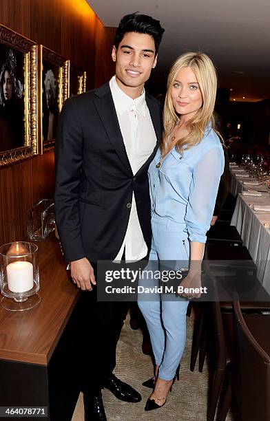 Siva Kaneswaran and Laura Whitmore attend the 'GUESS Loves Priyanka' VIP Dinner at the London Edition Hotel on January 20, 2014 in London, England.