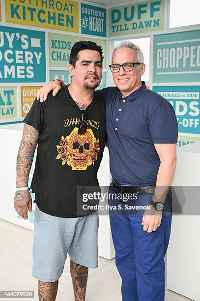 Aarón Sánchez and Geoffrey Zakarian pose at the KitchenAid Culinary Demonstrations during the 2015 Food Network & Cooking Channel South Beach Wine &...