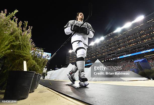 Anze Kopitar of the Los Angeles Kings and his teammates walk back to the locker room after warm-up prior to the 2015 Coors Light NHL Stadium Series...