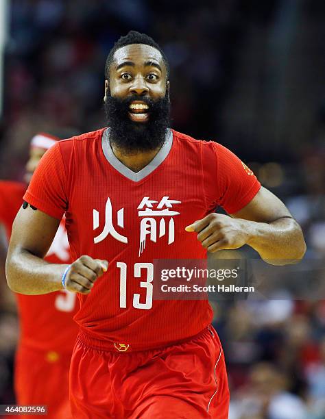 James Harden of the Houston Rockets celebrates after a basket during their game against the Toronto Raptors at the Toyota Center on February 21, 2015...