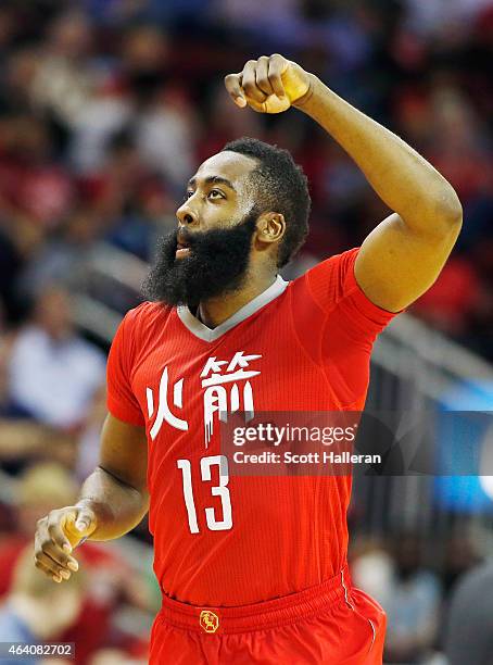 James Harden of the Houston Rockets celebrates after a basket during their game against the Toronto Raptors at the Toyota Center on February 21, 2015...