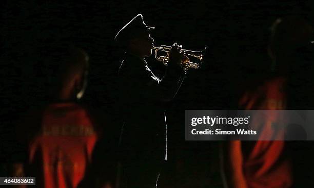 The last post is played to commemorate the ANZACs during the round 22 NBL match between New Zealand Breakers and the Cairns Taipans at Vector Arena...