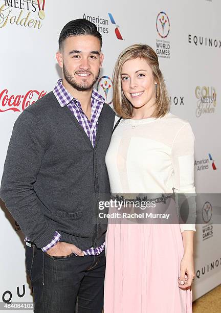 Olympic figure skater Ashley Wagner and Olympic Speed Skater Eddy Alvarez attend CW3PR presents Gold Meets Golden at Equinox Sports Club on February...