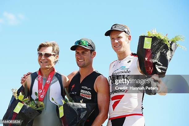 Courtney Ogden of Australia, Dylan McNeice of New Zealand and Dougal Allan of New Zealand celebrate on the podium following the Challenge Wanaka on...