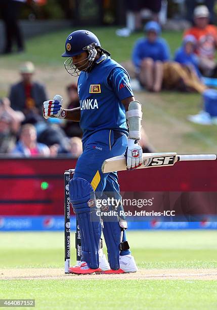 Mahela Jayawardene of Sri Lanka celebrates his 100 runs during the 2015 ICC Cricket World Cup match between Sri Lanka and Afghanistan at University...