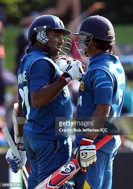 Mahela Jayawardene of Sri Lanka celebrates his 100 runs with Jeevan Mendis during the 2015 ICC Cricket World Cup match between Sri Lanka and...