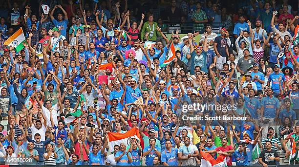 General view as Indian fans in the crowd cheer as India hit a boundry during the 2015 ICC Cricket World Cup match between South Africa and India at...