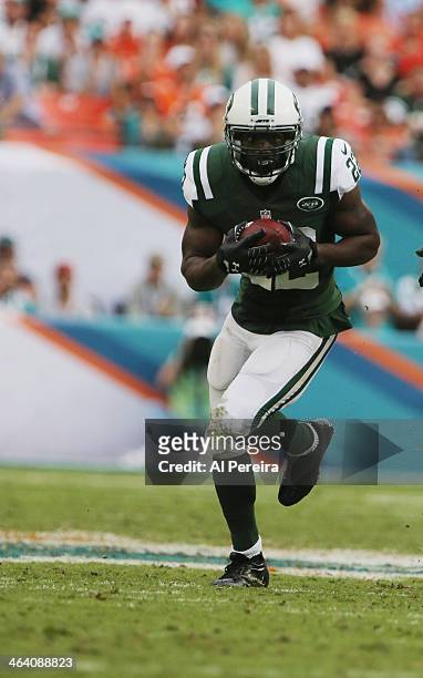 Safety Ed Reed of the New York Jets has an Interception against the Miaim Dolphins at Sun Life Stadium on December 29, 2013 in Miami Gardens, Florida.