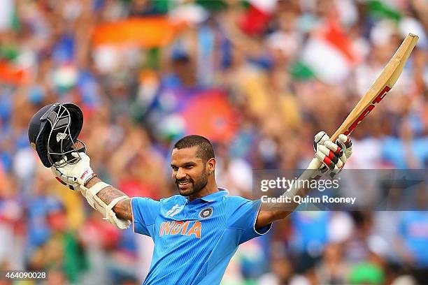 Shikhar Dhawan of India celebrates making a century during the 2015 ICC Cricket World Cup match between South Africa and India at Melbourne Cricket...