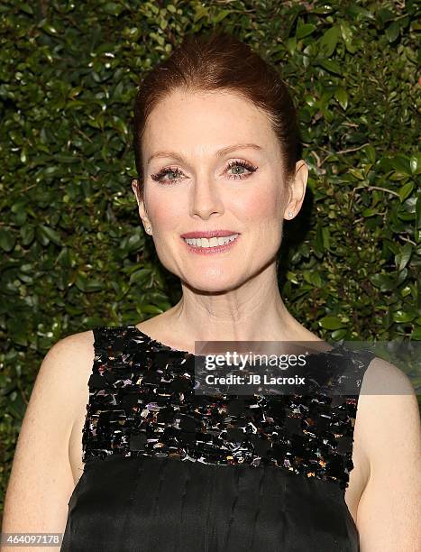 Julianne Moore attends the Chanel And Charles Finch Pre-Oscar Dinner at Madeo Restaurant on February 21, 2015 in West Hollywood, California.