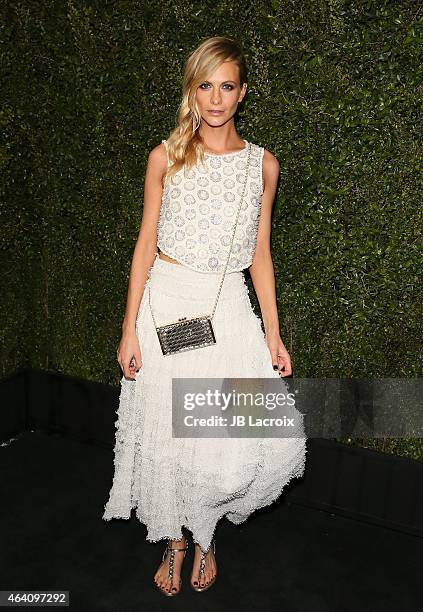 Poppy Delevingne attends the Chanel And Charles Finch Pre-Oscar Dinner at Madeo Restaurant on February 21, 2015 in West Hollywood, California.