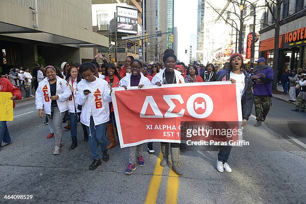 Members of Delta Sigma Theta Sorority, Inc. Participates in the 2014 Martin Luther King, Jr. March & Rally at Peachtree Street on January 20, 2014 in...