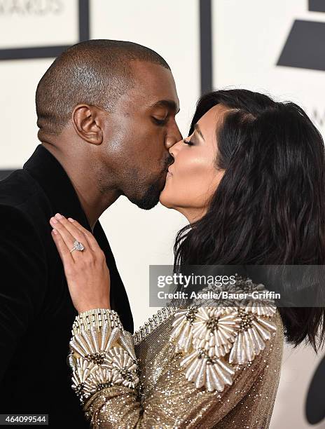 Recording artist Kanye West and TV personality Kim Kardashian arrive at the 57th Annual GRAMMY Awards at Staples Center on February 8, 2015 in Los...