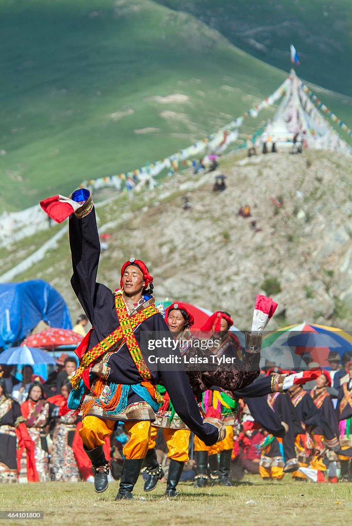 Khampa horseman performing traditional dance at the Yushu...