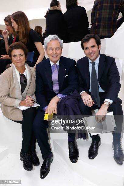 Of Galeries Lafayette Philippe Houze sitting between his wife Christiane Houze and their son Nicolas Houze attend the Christian Dior show as part of...