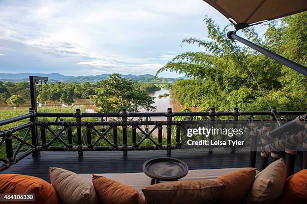 Bill Bensley designed guest tent at the Four Seasons Tented Camp in Thailand's Golden Triangle. Set on several hectares of land overlooking Burma and...