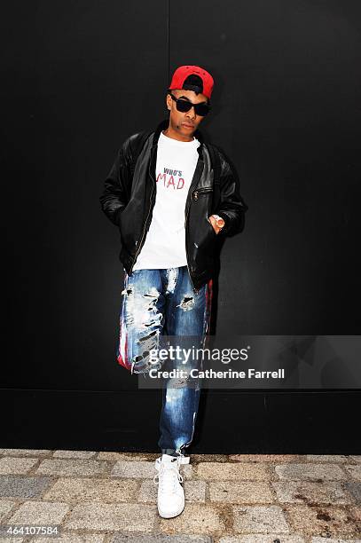 Musician Danny Ryder wearing an Akaso jacket, independent label Mad Fly tee shirt, JEANS UK independent label, hat by Echo, earrings by Ernest Jones,...