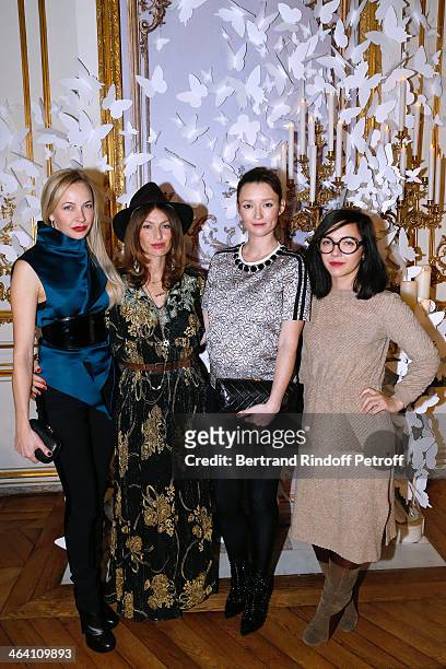 Melonie Hennessy Foster , Group 'Les Brigittes' members Aurelie Saada and Sylvie Hoarau and Audrey Marnay attend the Alexis Mabille show as part of...
