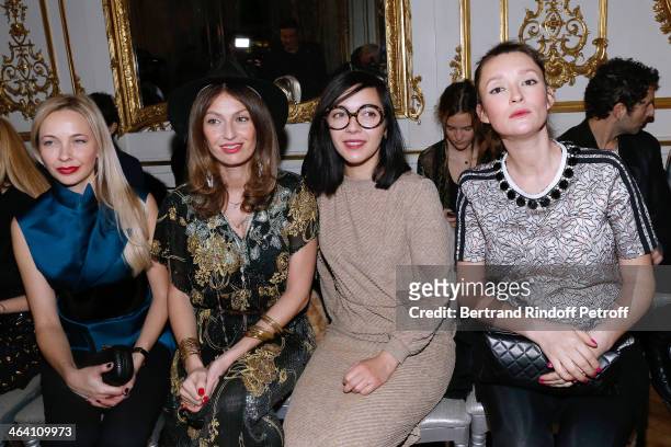 Melonie Hennessy Foster, Group 'Les Brigittes' members Aurelie Saada and Sylvie Hoarau and Audrey Marnay attend the Alexis Mabille show as part of...