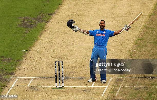 Shikhar Dhawan of India celebrates making a century during the 2015 ICC Cricket World Cup match between South Africa and India at Melbourne Cricket...