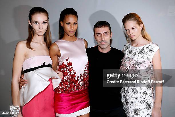 Fashion Designer Giambattista Valli poses with his models backstage after the Giambattista Valli show as part of Paris Fashion Week Haute Couture...