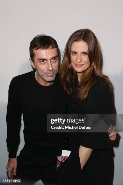 Giambattista Valli and Livia Firth attend the Giambattista Valli show as part of Paris Fashion Week Haute Couture Spring/Summer 2014 on January 20,...