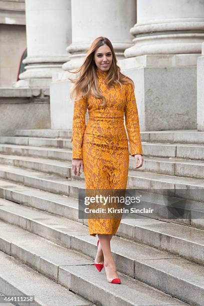 Modela and DJ Amber Le Bon wears an Emilia Wickstead dress, Chanel bag and Gianvitto Rossi shoes on February 21, 2015 in London, England.
