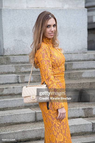 Modela and DJ Amber Le Bon wears an Emilia Wickstead dress, Chanel bag on February 21, 2015 in London, England.