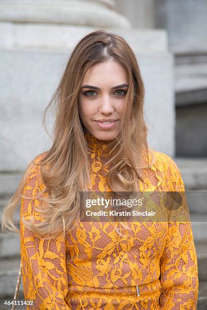 Modela and DJ Amber Le Bon wears an Emilia Wickstead dress, Chanel bag on February 21, 2015 in London, England.