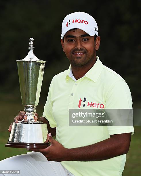 Anirban Lahiri of India holds the trophy after winning the Hero India Open Golf at Delhi Golf Club on February 22, 2015 in New Delhi, India.