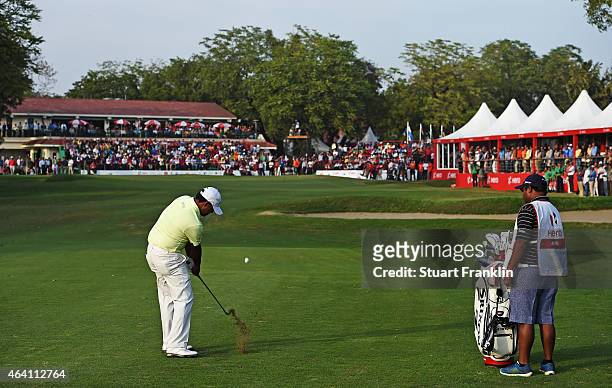 Anirban Lahiri of India plays his approach shot on the 18th hole during the playoff against S.S.P Chawrasia of India during the final round of the...