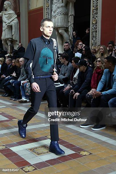 Model walks the runway during the Lanvin Menswear Fall/Winter 2014-2015 show as part of Paris Fashion Week on January 19, 2014 in Paris, France.