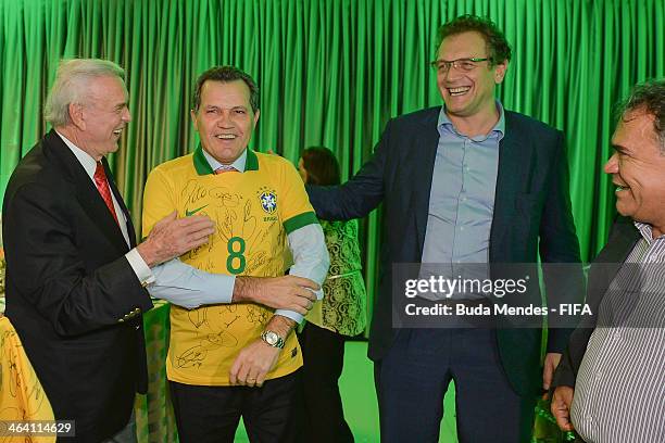 President of LOC 2014 Jose Maria Marin and FIFA Secretary General Jerome Valcke deliver an autographed shirt of the Brazilian team for Governor of...