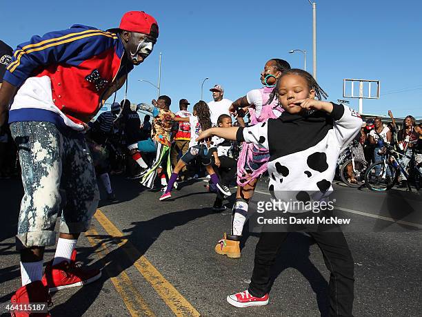Four-year-old Dior Edwards dances with the locally popular Tommy the Clown Hip-Hop dancers in the 29th annual Kingdom Day Parade on January 20, 2014...