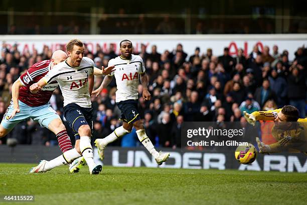 Harry Kane of Spurs scores past goalkeeper Adrian of West Ham from the penalty rebound to level the scores at 2-2 during the Barclays Premier League...