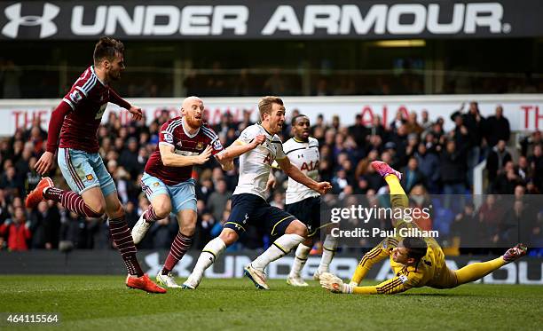 Harry Kane of Spurs scores past goalkeeper Adrian of West Ham from the penalty rebound to level the scores at 2-2 during the Barclays Premier League...