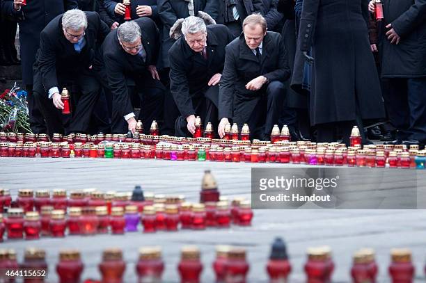 In this photo provided by the German Government Press Office , President of Poland Bronislaw Komorowski, German President Joachim Gauck and European...