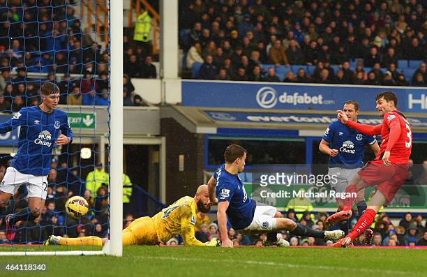 David Nugent of Leicester City scores their first and equalising goal during the Barclays Premier League match between Everton and Leicester City at...